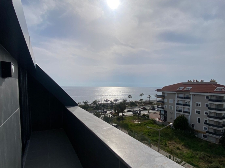 Seafront duplex for sale in Kestel