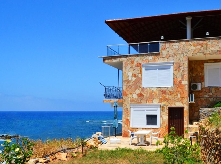 seafront villa for sale in Demirtaş