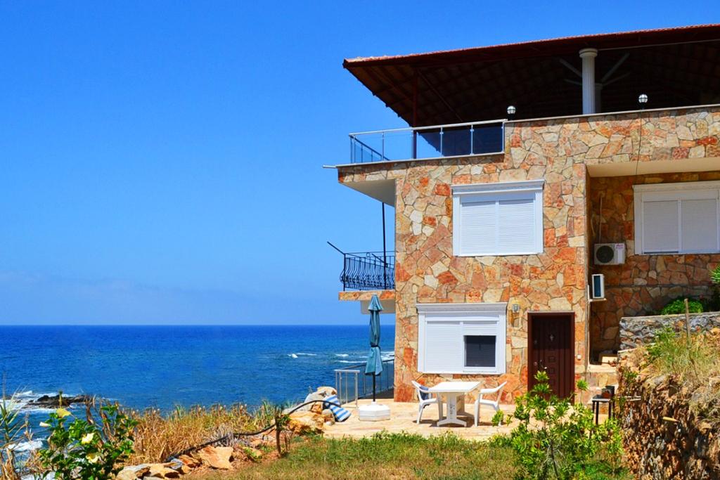 seafront villa for sale in Demirtaş